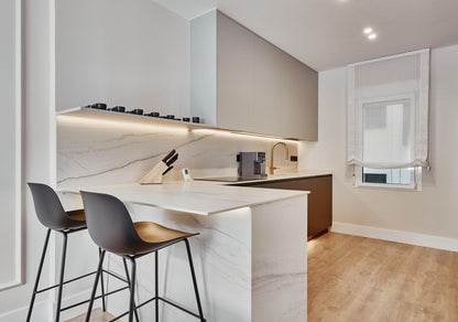 Piso de diseño en Madrid con cocina abierta de diseño en la calle Ibiza